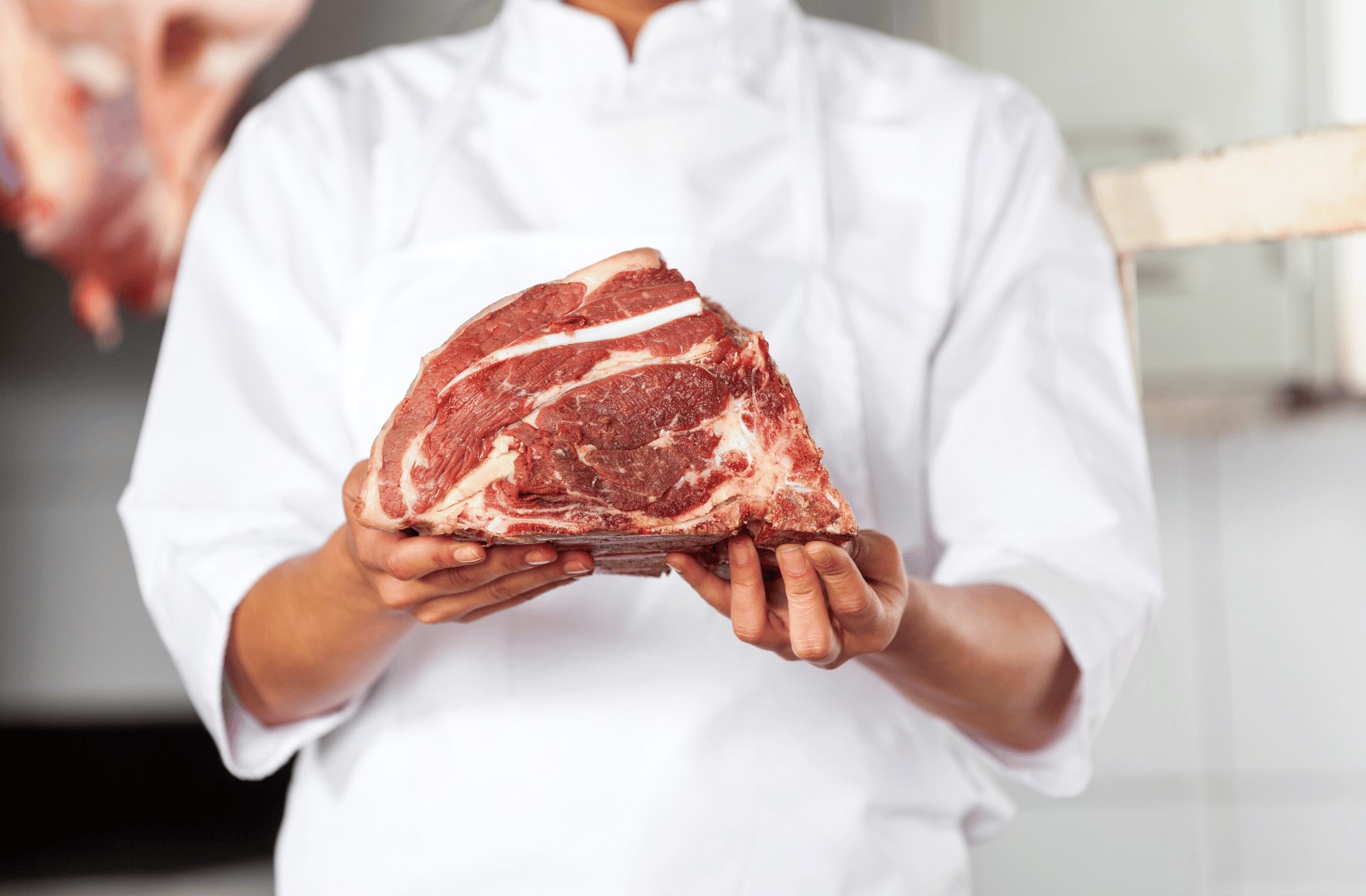 Brighton Locker butcher with a fresh-cut ribeye